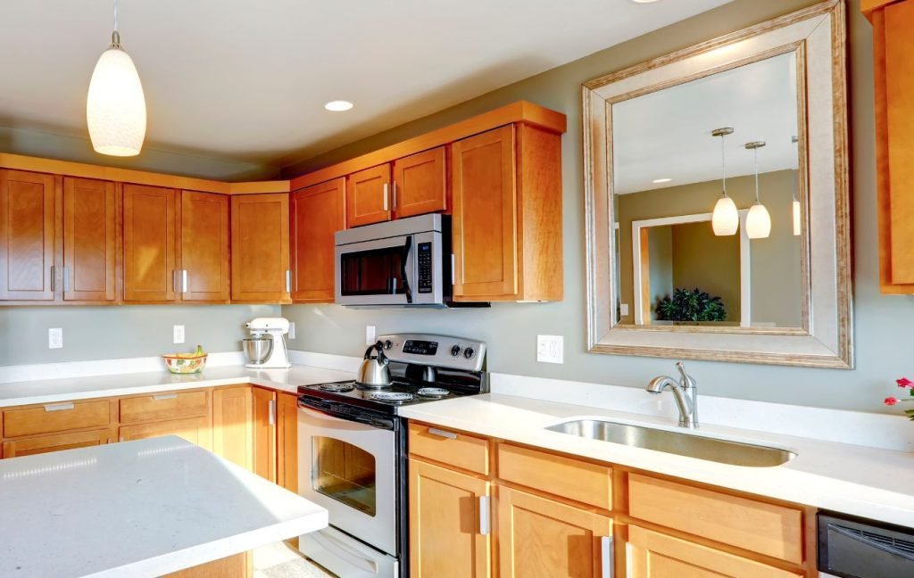 Hang a mirror in the small kitchen