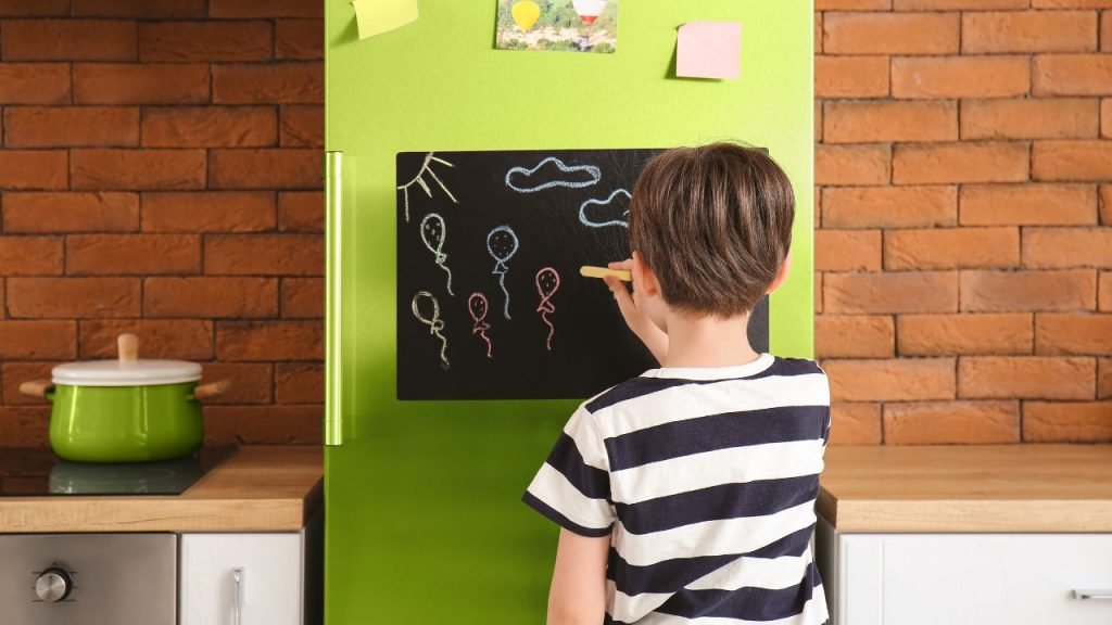 Install a chalkboard on one of the kitchen cabinets
